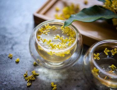 a close up of two glasses of Osmanthus tea