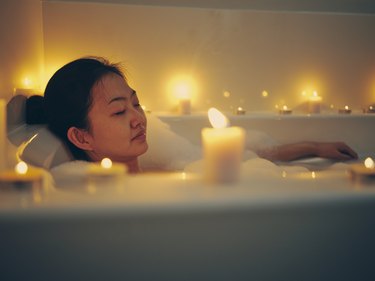 woman Taking a Candlelight Bath as a form of self-soothing