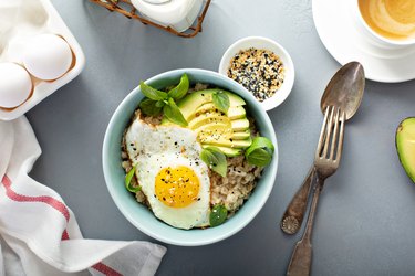 A breakfast for healthy hormones of savory oatmeal with egg and avocado