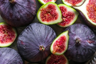 Fresh fig fruit and slices of figs