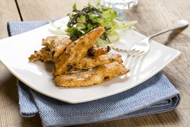 Broiled chicken tenders with side salad