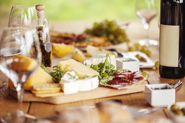 Cheese Board And Red Wine made up of histamine-rich foods