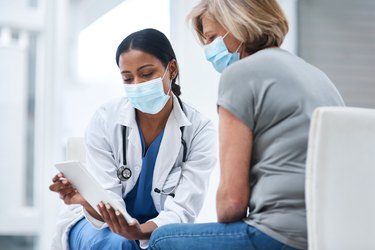 Doctor talking to a patient with fibroids