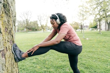 Wellbeing activities - woman  is  exercising outdoor