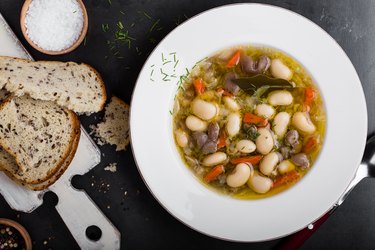 Vegetarian soup with white beans and mushrooms