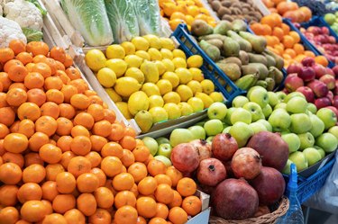 Fruits and vegetables at grocery store to illustrate how to get off your acids