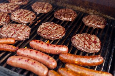 Barbeque Grill with Red Meat Hamburgers hot dogs and sausage bad for your heart