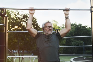 portrait of an active senior man doing exercise in the city of Berlin