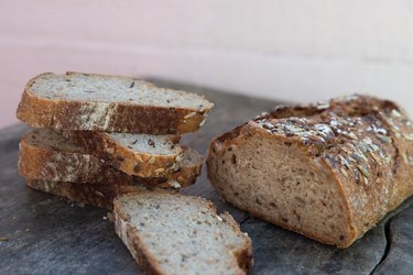 slices of finest sprouted grain bread on a cutting board