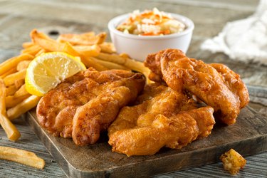 Fish and Chips on a Wooden Board