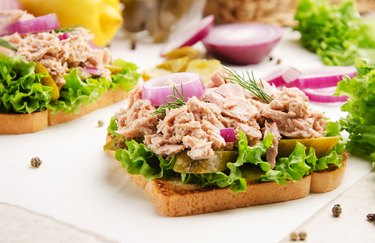 Tuna sandwiches with pickled cucumbers and onions, as an example of canned foods for weight loss