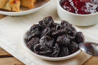 Antioxidant-rich prunes on plate