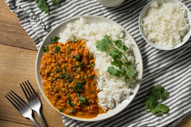 Homemade Spicy Indian Curry Lentils with rice in a bowl
