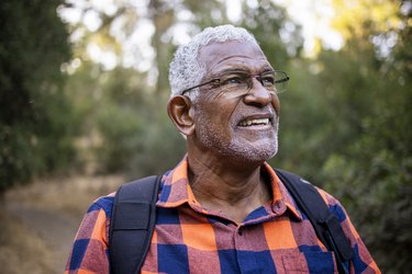 Senior Black Man Hiking in Nature