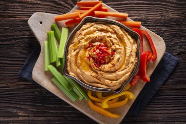 Roasted Red Pepper Hummus with veggie sticks for a gut-healthy snack