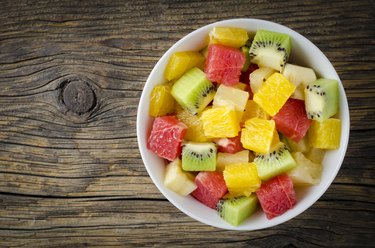 Fresh fruit salad with digestive enzym fruits pineapple and kiwi