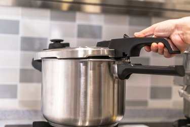 using pressure cooker for meat in kitchen