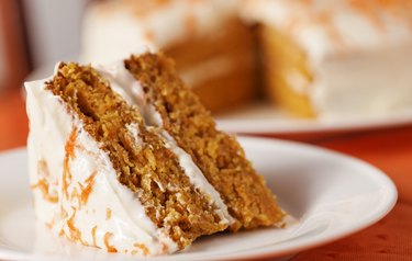 homemade carrot cake on white plate