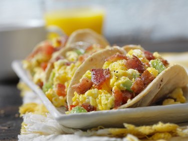 high fiber breakfast recipe of breakfast tacos with eggs bacon and avocado