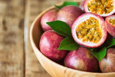 Close-Up Of fiber-rich passionfruit In Bowl On Table