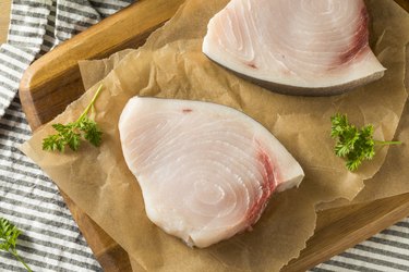 mercury-rich raw organic swordfish steak filets