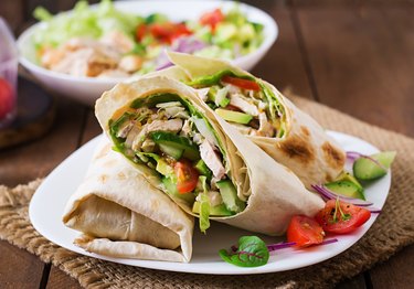 Fresh tortilla wraps with chicken and fresh vegetables on plate oven-free dinner recipe