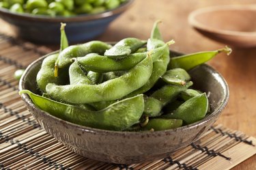 Green phosphatidylserine-rich soybeans with sea salt in bowl