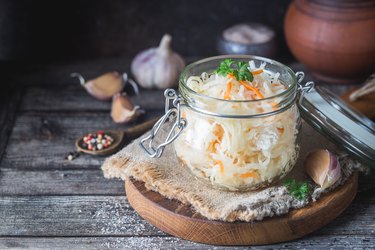Glass jar with homemade histamine-rich sauerkraut