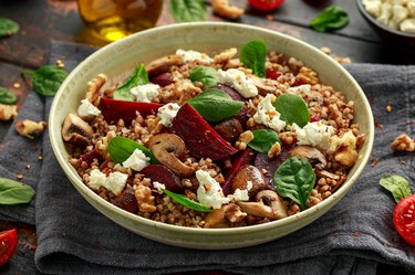 oxalate-rich Buckwheat and beetroot salad with mushroom, walnut, spinach and feta cheese. healthy diet food