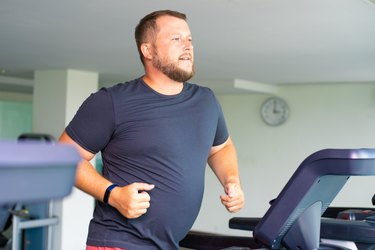 Man running on a treadmill