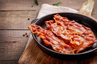 fried crispy bacon slices on pan