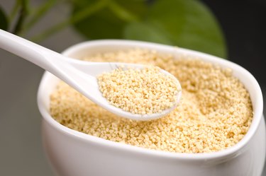 A ceramic bowl and spoon filled with Lecithin granules