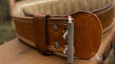 close up of leather weight-lifting belt