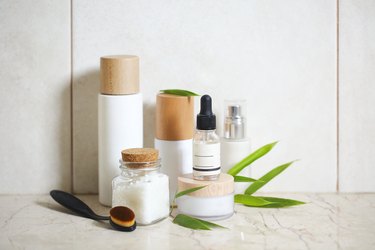 Skincare product line-up on bathroom counter