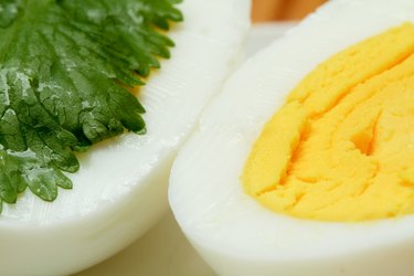 Cooked eggs decorated with parsley