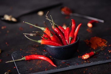 small red chili pepper on a black board