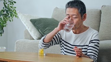 person taking supplements at home that might change odor or color of urine