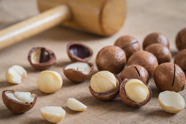 Macadamia nuts on wooden table