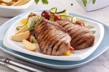 Grilled chicken breast, a good source of sulfur,  with a vegetable salad