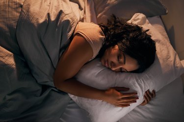 a person sleeping in bed