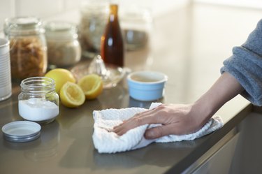 Cleaning kitchen with white vinegar