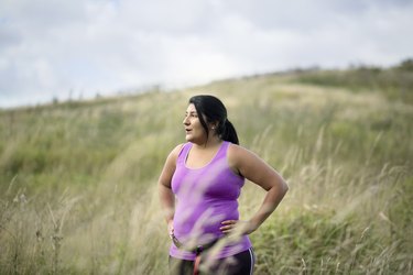 woman with chronic fatigue syndrome resting while exercising outside