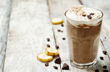 coffee chocolate banana smoothie with coconut whipped cream
