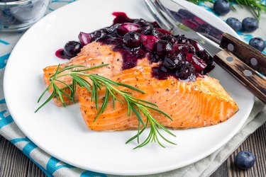 Baked salmon fillet with blueberry and rosmarin sauce, horizontal