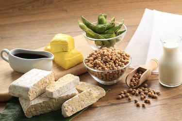 Soy Product: Raw Tofu, Tempeh, Soy Milk, Soy Sauce, and Soy Bean. Concept of Healthy Vegetarian Food