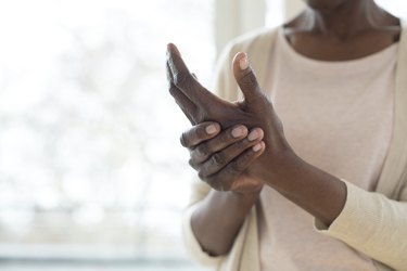 Woman with arthritis hand pain