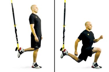 Man performing TRX lunge.