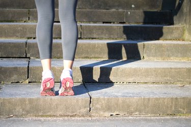 Woman doing Calf Raises before her run