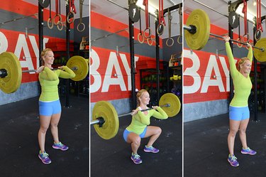 Woman performing thruster exercise.