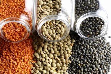 Lentils spilling from glass jars